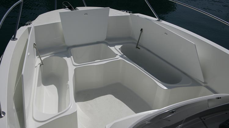 Large storage space with five drainable wells and stern bilge compartment